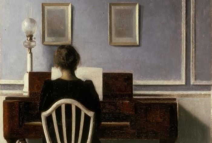 Vilhelm Hammershoi - Interieur mit junger Frau am Klavier